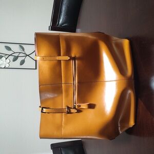 Large leather purse/laptop holder, the color is caramel, brand is Kattee